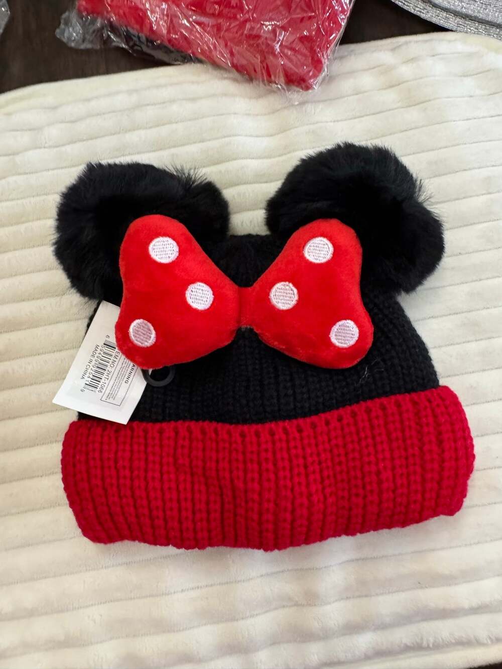 Disney Minnie Mouse kid red & black knit hat with white polka dots and Pompoms